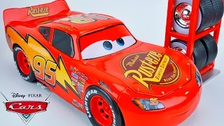 DISNEY PIXAR CARS LIGHTNING MCQUEEN TIRE CHANGE PIT STOP PISTON CUP RADIATOR SPRINGS