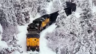 Awesome Powerful Train plow through snow railway tracks