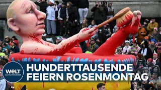 ROSENMONTAG OHNE EINSCHRÄNKUNGEN: Hunderttausende feiern - Ukraine-Krieg dominiert die Motiv-Wagen