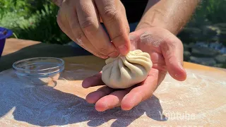 COOKING KHINKALI ON A CAMPFIRE IN NATURE. ENG SUB