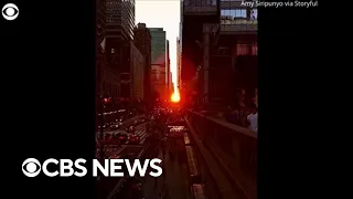 "Manhattanhenge" sunset wows New Yorkers