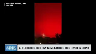 After blood-red sky comes blood-red river in China