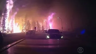 Wildfire drives massive evacuation in Alberta, Canada