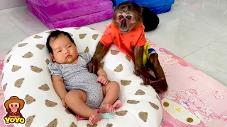 YoYo JR looks after the sleeping baby for mom