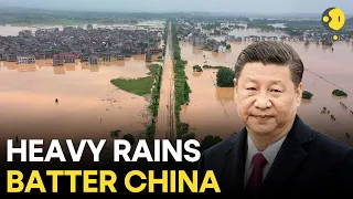 China Floods LIVE: Soldiers trek for hours to reach flood-stranded Beijing villagers | China LIVE