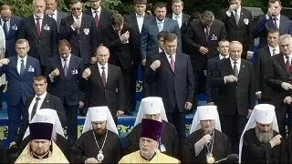 Putin visits Ukraine to mark region's conversion to Christianity
