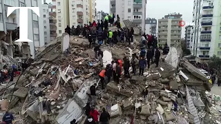 Drone footage shows rescue efforts after building collapses in the city of Adana