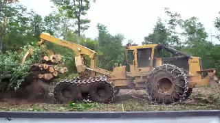 Cat 320C FM Delimber And Tigercat 635D Skidder