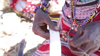 Maasai women beading