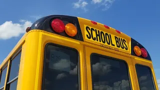 Tow lights & hooking up to new school bus  drive away