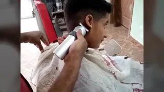 Barber pranks kids by pretending he's cut his ear off👂👂👂👂.