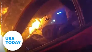 Two Atlanta police officers rescue man from burning car | USA TODAY