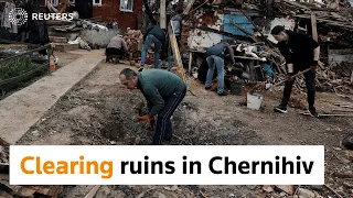 Chernihiv residents clear debris from destroyed homes