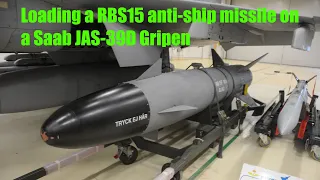 Loading a RBS-15 anti-ship missile on a Saab JAS-39 Gripen fighter jet of the Swedish Air Force