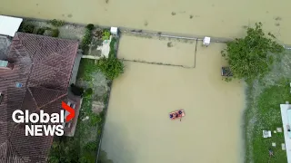 Italy floods: Drone video shows scale of flooding damage in northern region