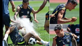 Philippe Coutinho gets covered in eggs and flour by his Brazilian team mates in training