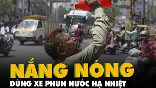 Nắng nóng kỷ lục, Ấn Độ dùng xe phun nước vào người đi đường để hạ nhiệt