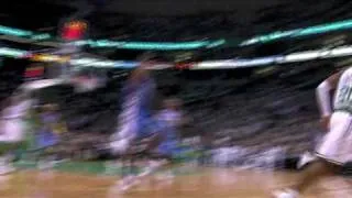 Carmelo Anthony finishes a teamwork play against the Celtics