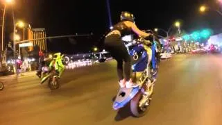 Girl rides in Las Vegas rear wheel.