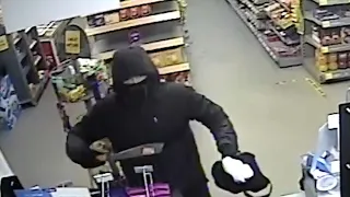 CCTV footage released after knifepoint robbery on shop