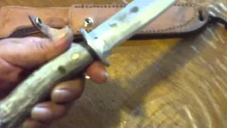 Joe Garza Made knife and sheath for survival