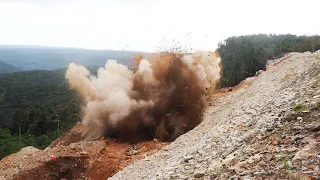 Power of Massive Stone Explosion Excavators Cutting On High Mountain Road Construction Technology