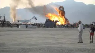 Burning Man 2014: "The Embrace" burns at sunrise