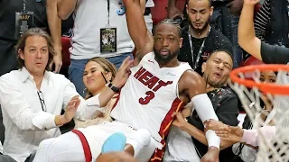 April 09, 2019 - WSVN - Dwyane Wade Knocks Drink on Legend in Final Home Game with Iconic Photo