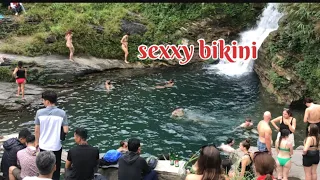 Bikini girl swimming at the waterfall. What men want to see