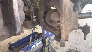 Removing Front Axle Shafts and Vacuum Hub Seals on Excursion and Ford Super Duty f-250 f-350