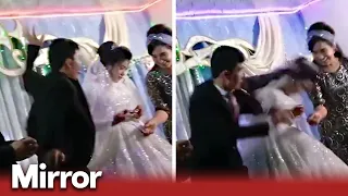 Groom punches bride at their wedding