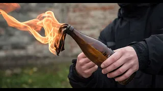 Ukrainian civilians set Russian Military Vehicles on Fire with Molotov Cocktails