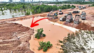 Completing Land To Other Site With Team Heavy Dump Truck Unloading Stones