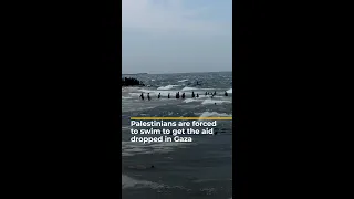 Palestinians are forced to swim to get the aid dropped in Gaza | AJ #shorts