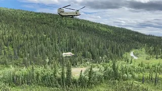 "WILD" VIDEO: Alaska Guardsmen airlift "Into the Wild" bus