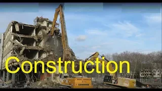 Excavator Liebherr 974 and CAT 390 huge demolition site