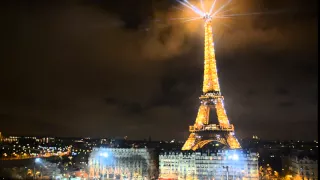 Eiffel Tower light show in the fog