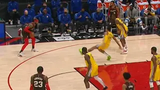 Juan Toscano-Anderson goes flying after making contact with Carmelo Anthony