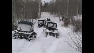 Argo 8x8s with snow tracks riding in Wyoming