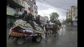 Palestinians reach Muwasi after leaving Rafah