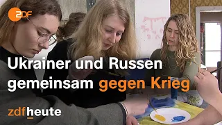 Ukrainer und Russen in Deutschland: Seite an Seite gegen den Krieg