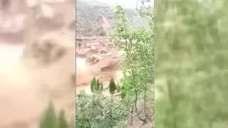 Heavy rain causes dam failure in a reservoir in NW China