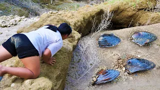 The clams in the river are very rich, and she extracted the pearls inside, which look very beautiful