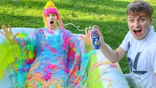 10,000 CANS OF SILLY STRING VS POOL!!