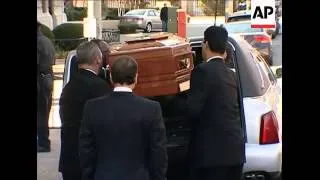A mahogany casket bearing the body of Natasha Richardson has left the New York townhouse where stars