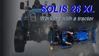 SOLIS_26_XL Working with a tractor