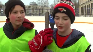 Russian children play traditional ice hockey by wearing felt boots-"Valenki" from Saint Petersburg