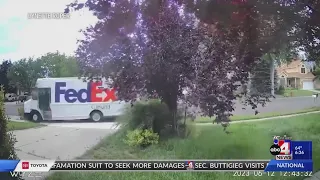 FedEx truck crashes through Sandy neighborhood