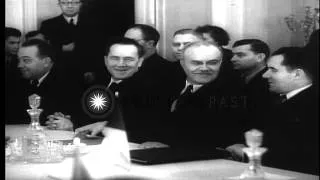 Molotov and representatives of various Eastern European countries sign a document...HD Stock Footage