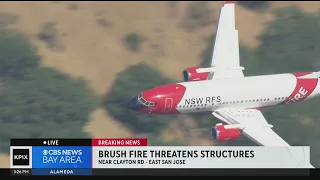 Cal Fire spokesperson discusses brush fire threatening homes in the South Bay
